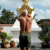 Lama Ole Nydahl doing prostrations by the stupa in Rødby, Denmark