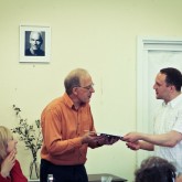 Rev. Alan Gadd exchanging gifts at the Diamond Way Buddhist Centre