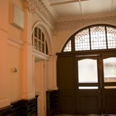 Front door of the Beaufoy Institute seen from inside the hallway