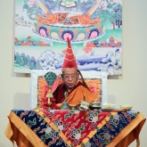 Sherab Gyaltsen Rinpoche wearing the ceremonial pandit hat during the initiation of Loving Eyes, 28 July 2013
