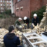 Lama Ole Nydahl and friends cleaning original bricks from the Beaufoy Institute, London April 2013